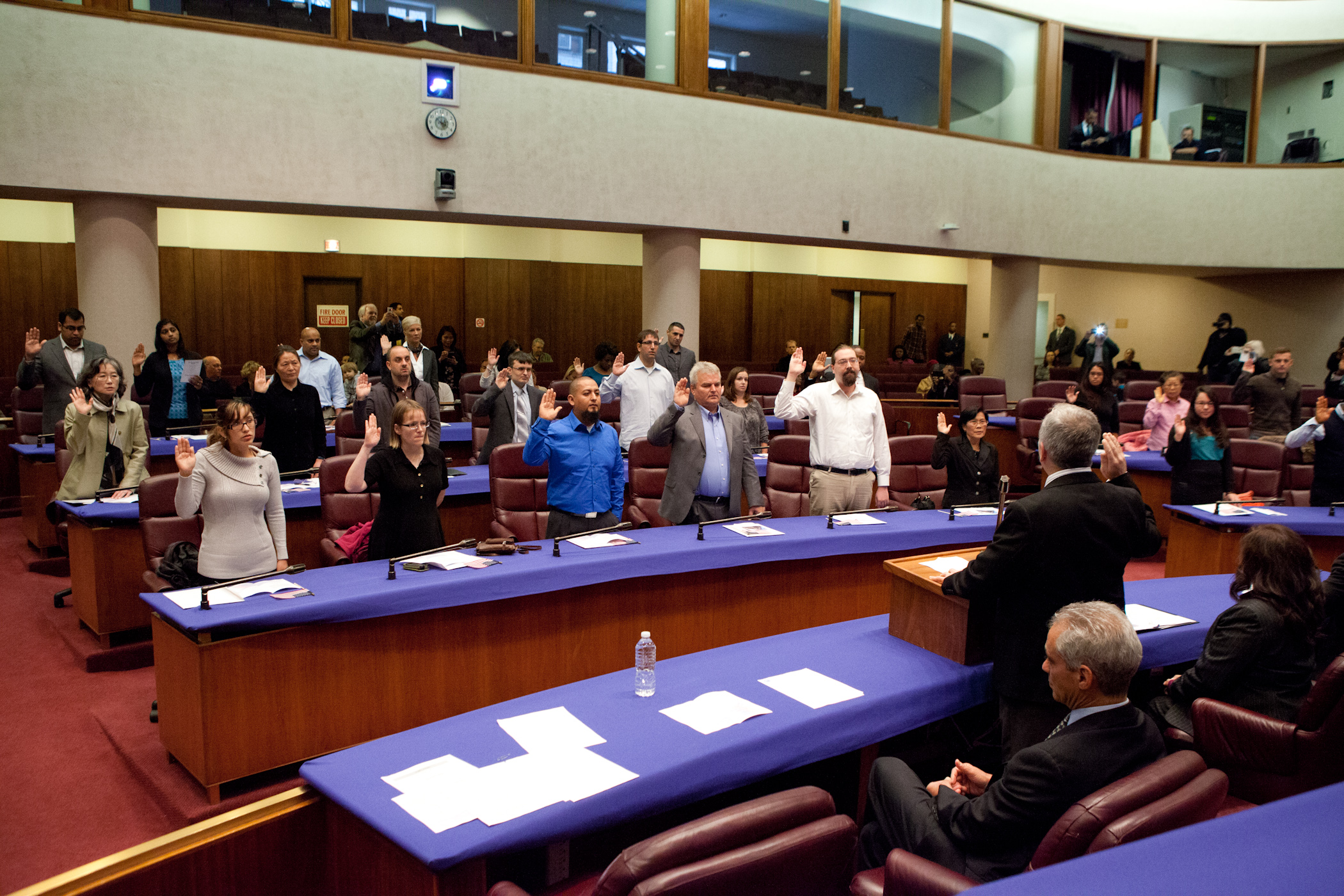 Mayor Emanuel congratulates 45 newly naturalized citizens representing 24 countries at City Council Chambers.